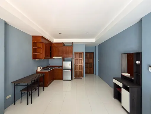 Studio room kitchen and dining area